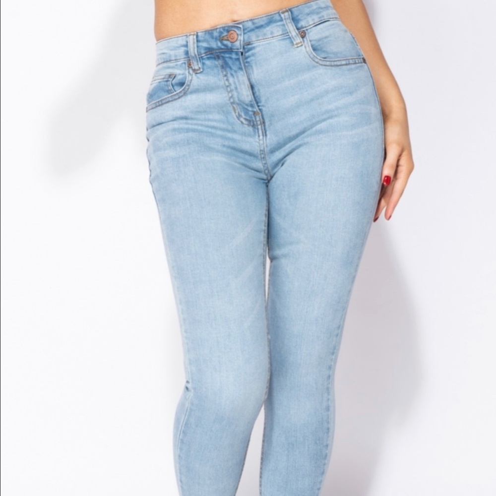Light Blue Distressed Skinny Jeans NWT. Ask me for sizes left. Thanks